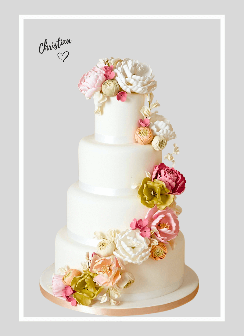 4 tiered wedding cake adorned with elegant cascading sugar flowers