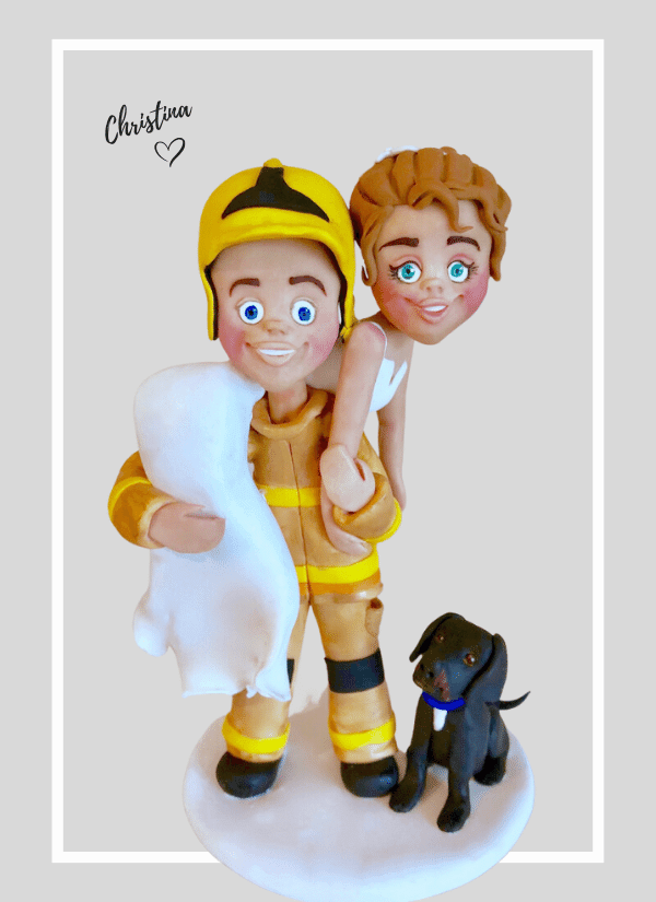 Fun wedding cake topper - fireman lift