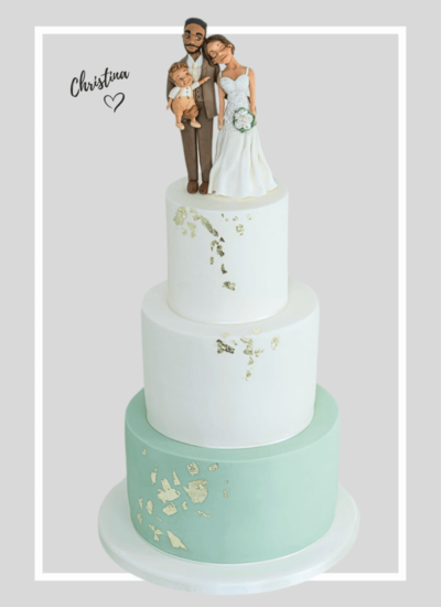 3 tier white a green modern wedding cake with gold leaf, topped with a personalised family clay bespokewedding cake toppper