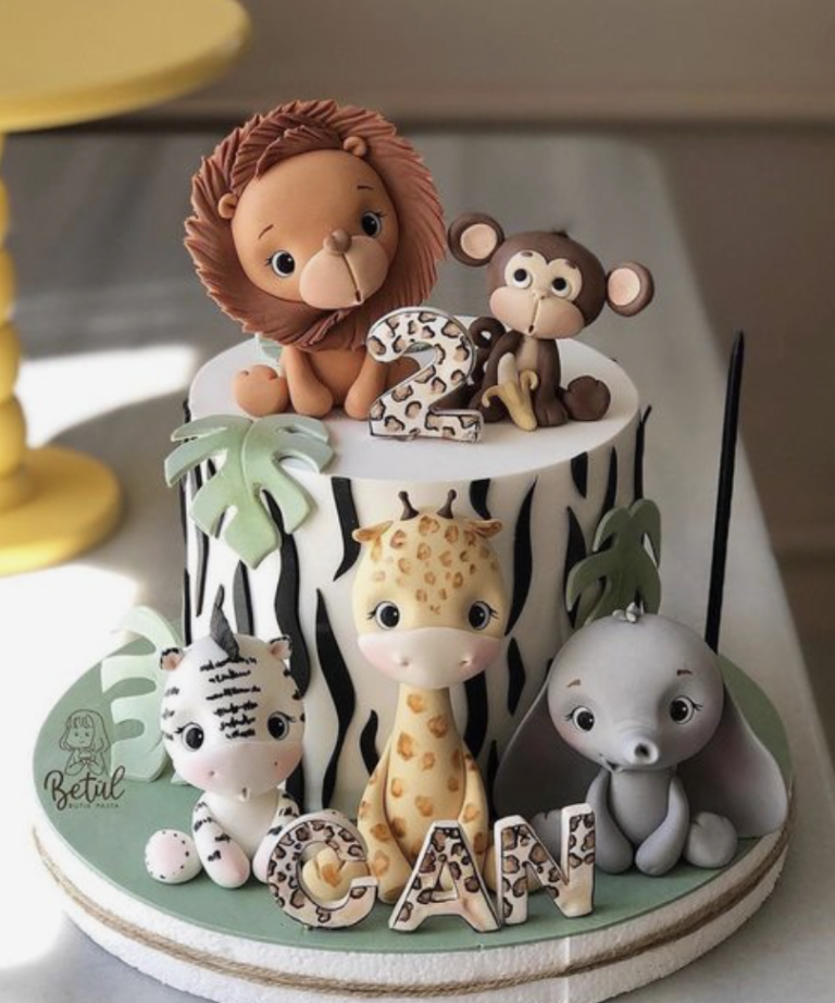 animal cake for wild one birthday cake